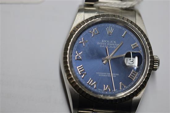A gentlemens Rolex stainless steel Oyster Perpetual Datejust Superlative Chronometer with blue Roman dial, original box and papers,